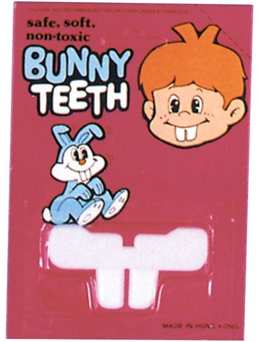 Зубы кролика белые